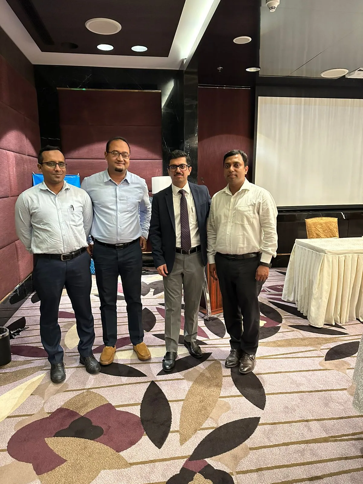 Dr. Arefin with colleagues at conference hall 2023
