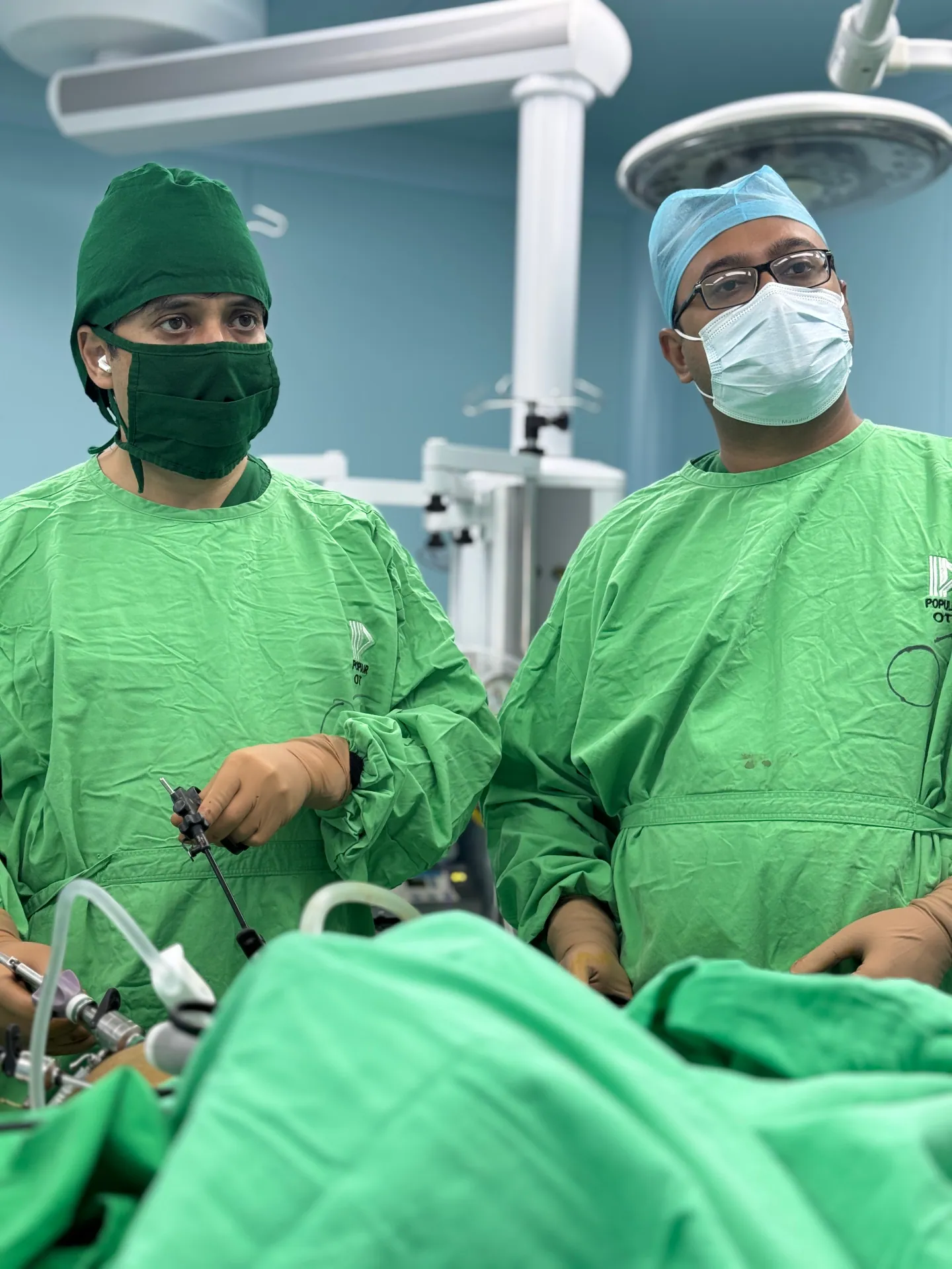 Dr. Murshidul Arefin laparoscopic surgery duo at Popular Medical College