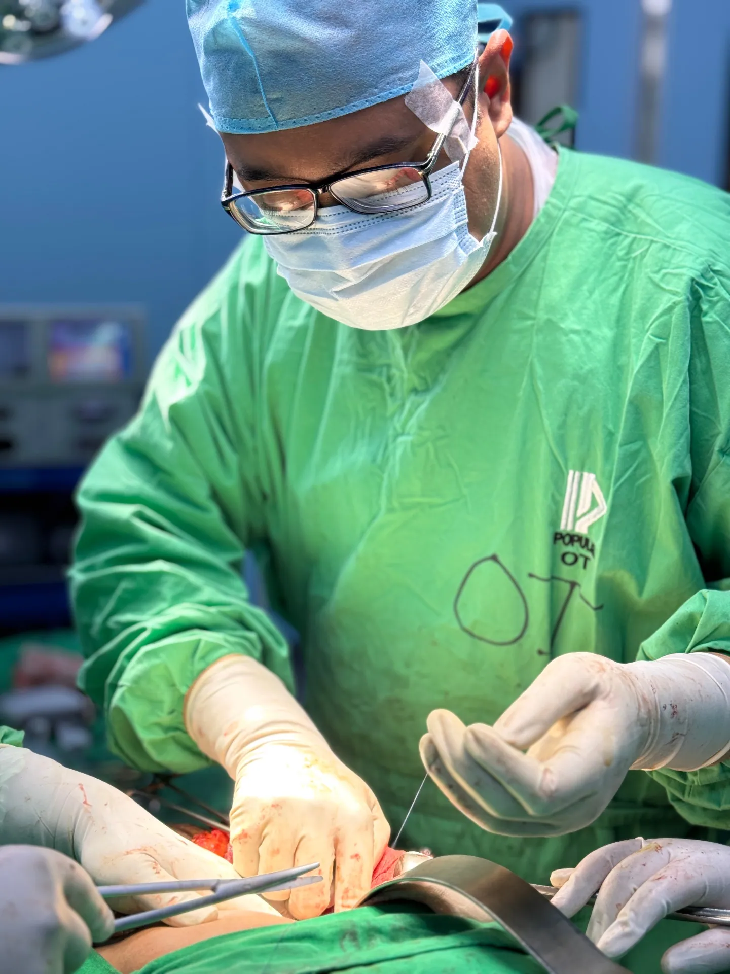 Dr. Murshidul Arefin open surgery closeup at Popular Medical College