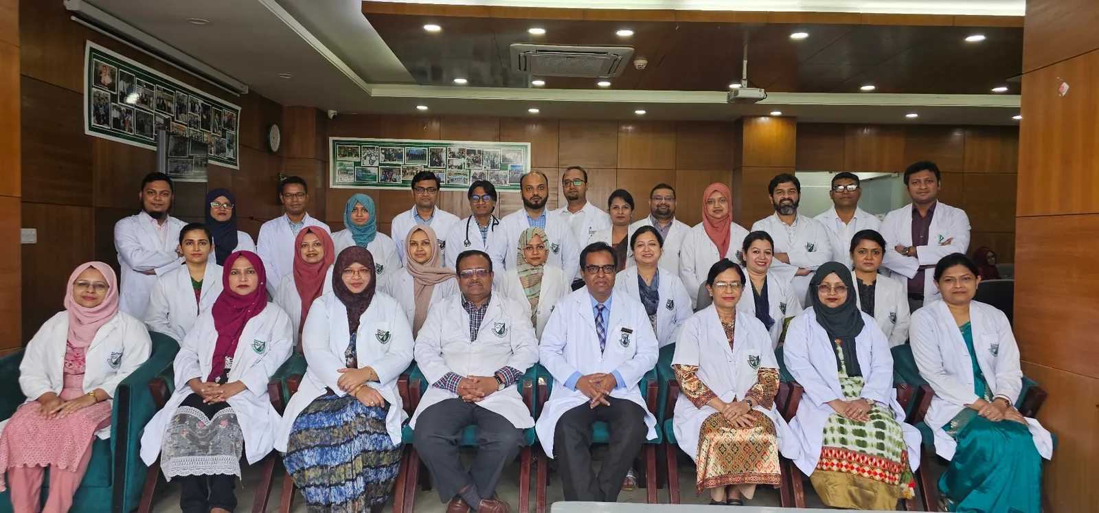 Dr. Murshidul Arefin with full staff at Popular Medical College Hospital